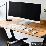 Home 18 인체공학적 데스크의 장점과 선택 기준 - A modern ergonomic home office setup featuring an electric sit-stand desk with a large surface area,...